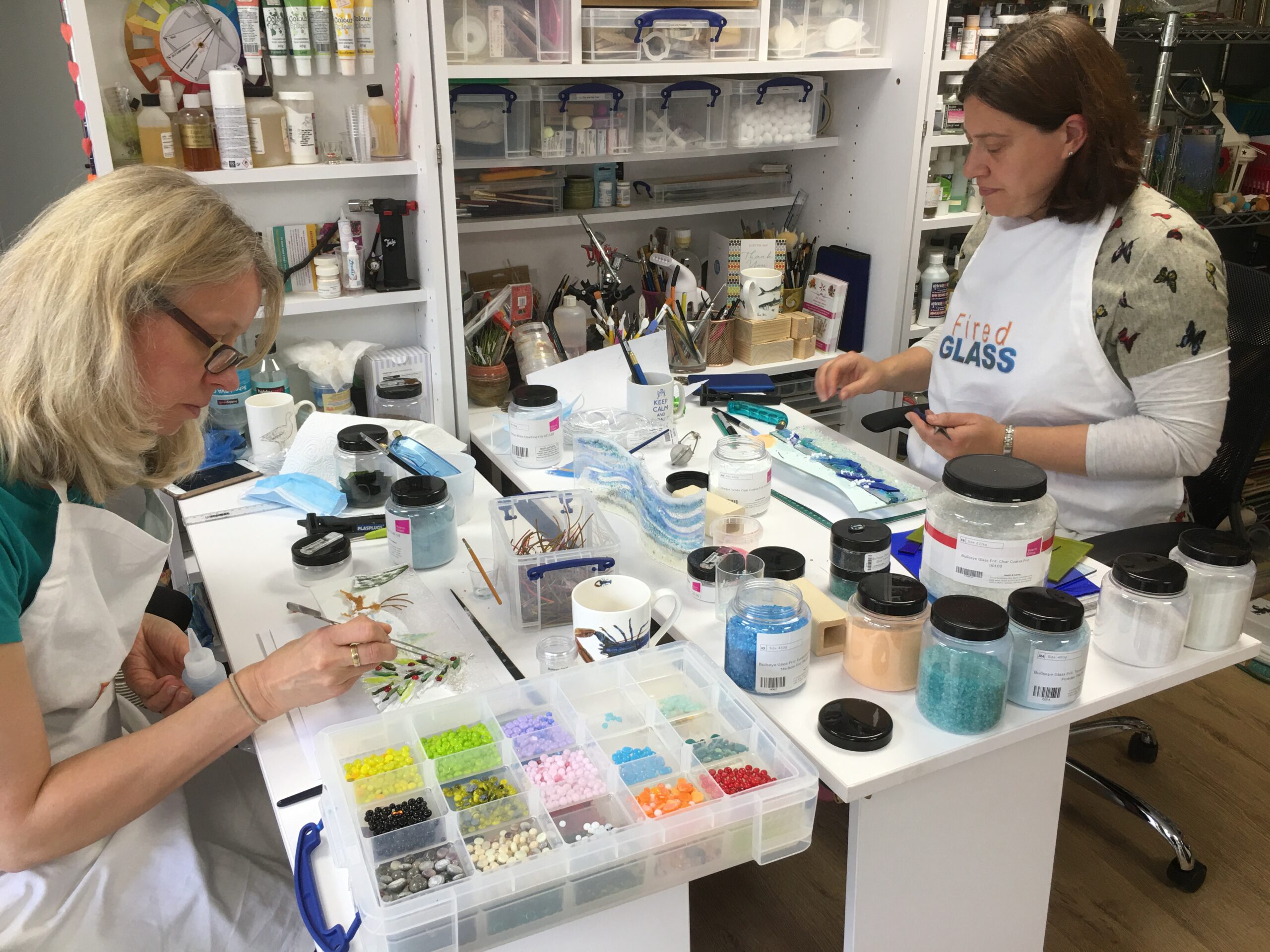 Annette and Jenny concentrating on their artwork.